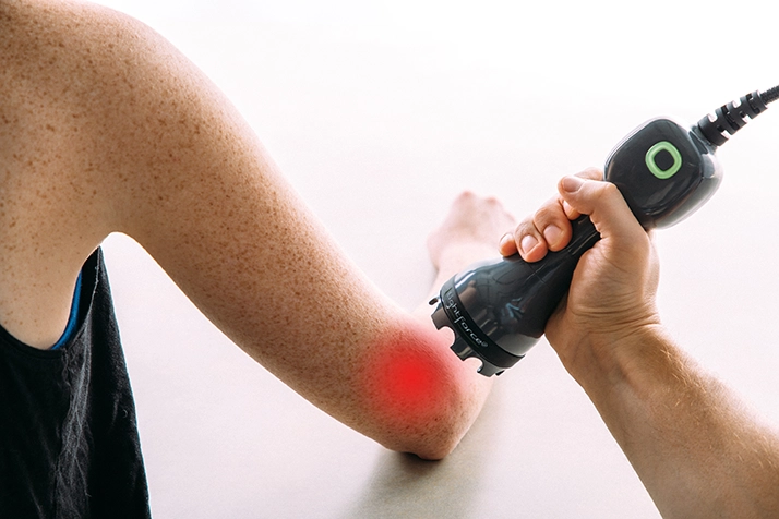 Chiropractic Plano TX Deep Tissue Therapy Laser On Elbow